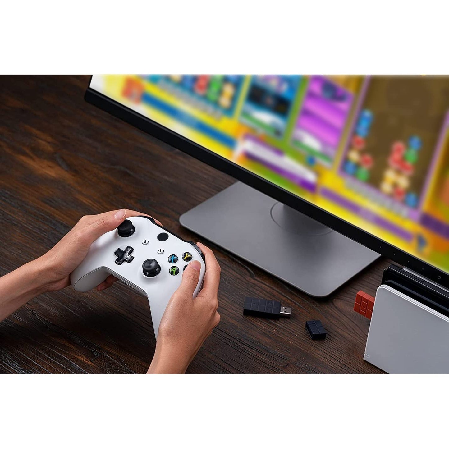 Wireless controller being used on a desktop PC through the 8Bitdo Bluetooth Adapter 2 connected to the system.