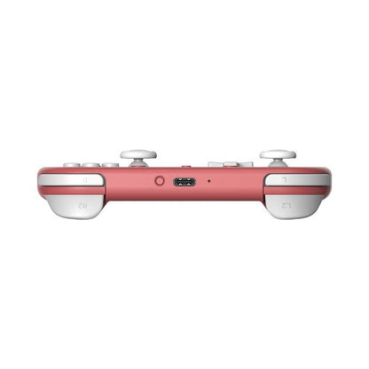 Bottom view of 8BitDo Lite 2 pink gamepad showing USB-C port and L/R shoulder buttons.