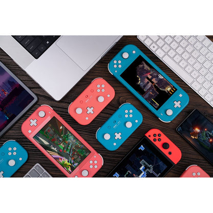 Flat lay of multiple 8BitDo Lite 2 controllers next to Switch Lite, Switch, and other gaming devices.